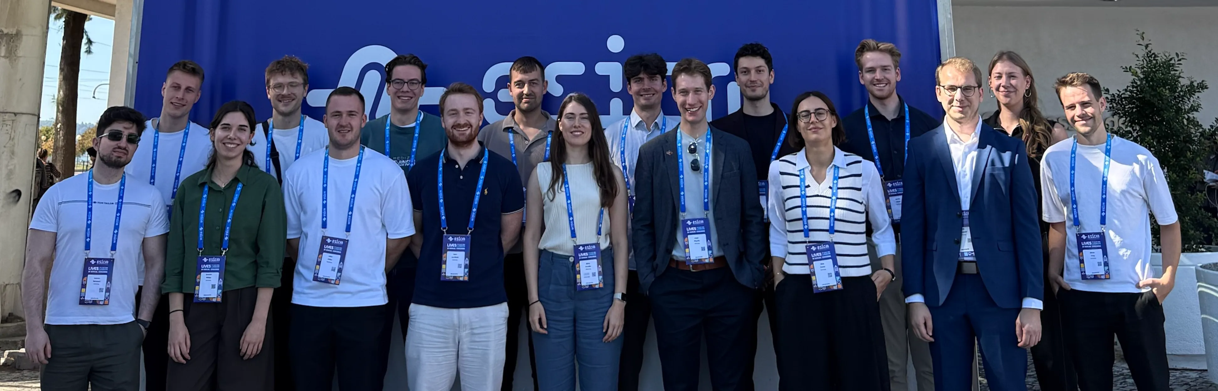 The CORR Group standing together in front of the ESICM banner at ESICM27 in Lisbon.